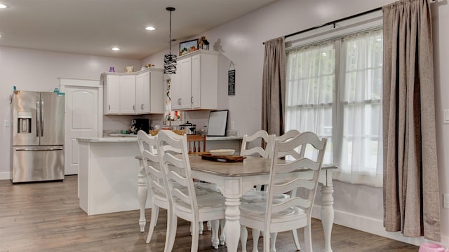 dining area featuring light hardwood / wood-style floors