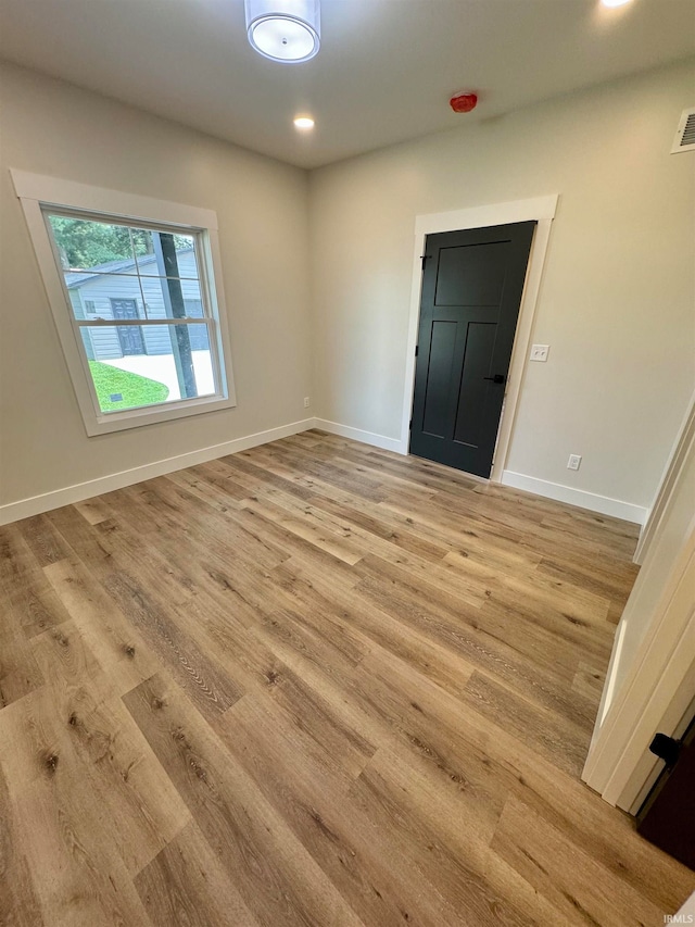 empty room featuring light hardwood / wood-style flooring