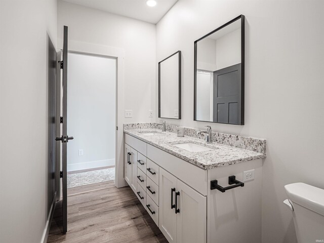 bathroom with toilet and tiled shower / bath combo