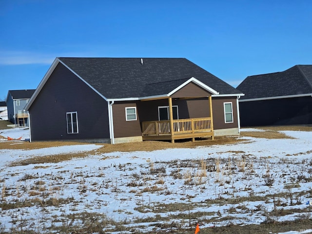 view of snow covered property