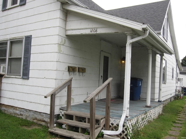 property entrance with a wooden deck