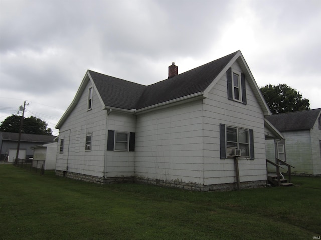 view of property exterior featuring a lawn