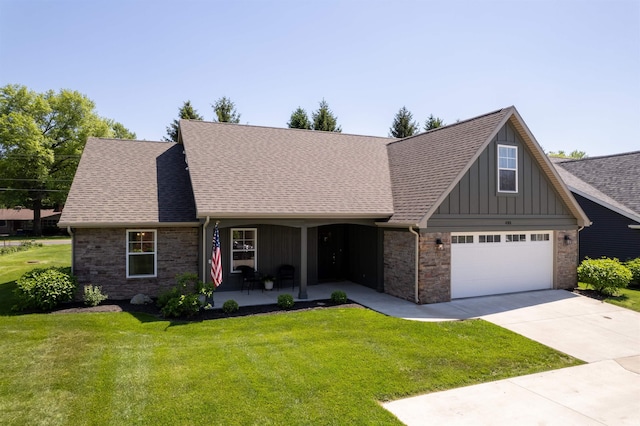 view of front facade with a garage and a front yard