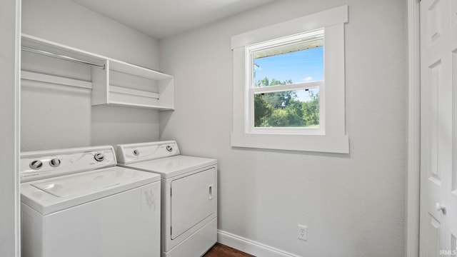 washroom with independent washer and dryer