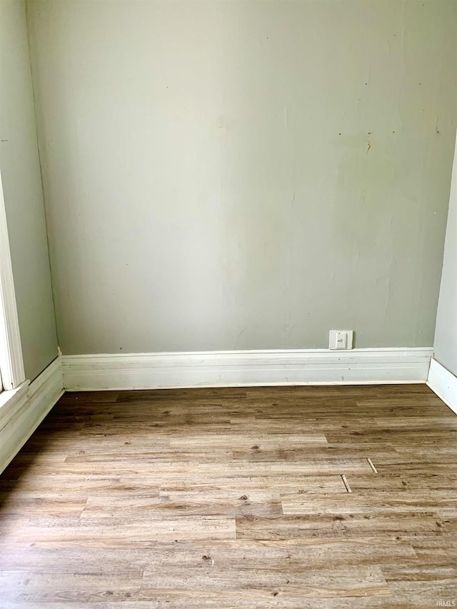 spare room featuring light hardwood / wood-style flooring