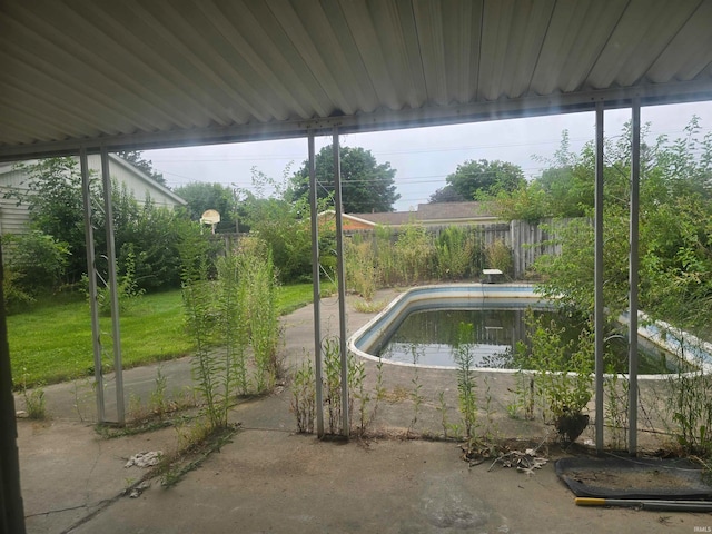 view of patio / terrace featuring a fenced in pool