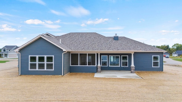 rear view of property with a patio