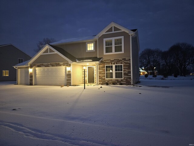 craftsman-style home with a lawn