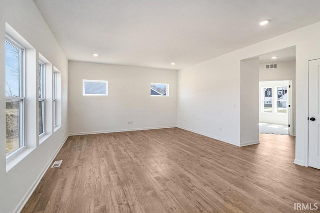 unfurnished room featuring wood-type flooring