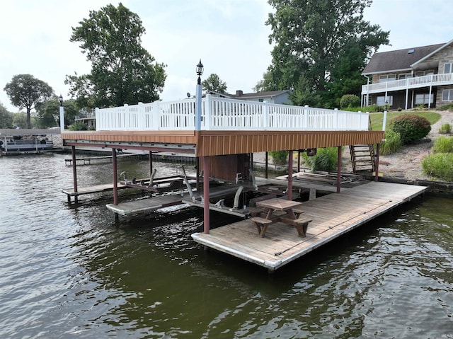 dock area featuring a water view and boat lift