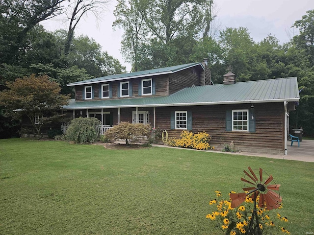 view of front of home featuring a front yard