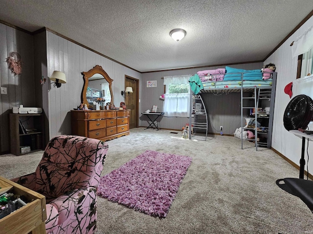 bedroom featuring crown molding, carpet flooring, and a textured ceiling