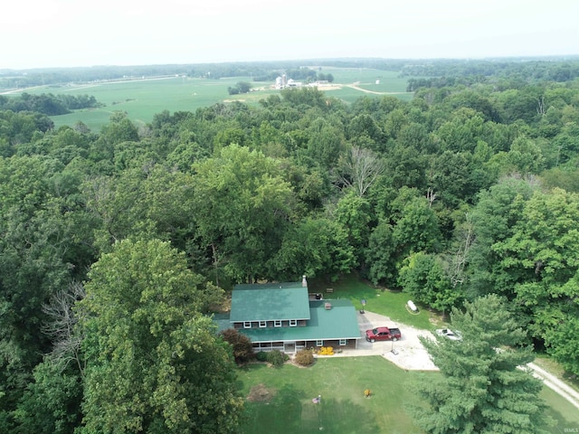 birds eye view of property with a rural view