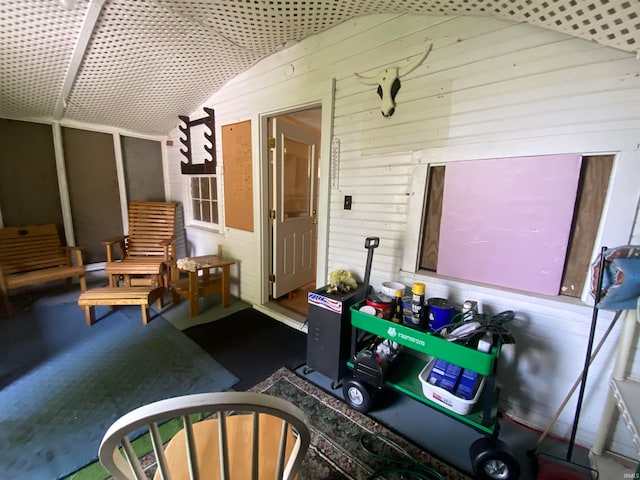 interior space featuring lofted ceiling