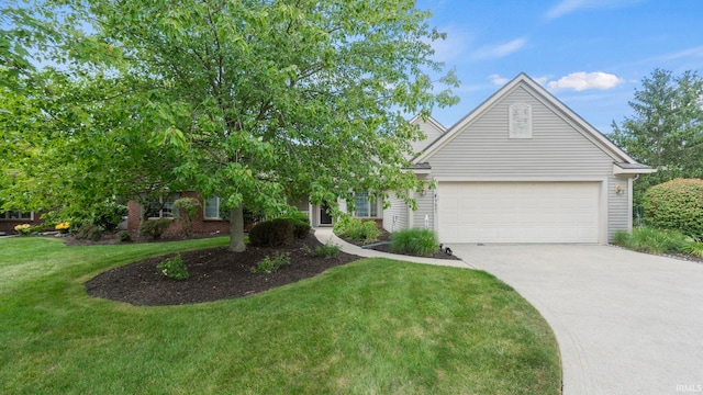 view of front facade with a garage and a front yard