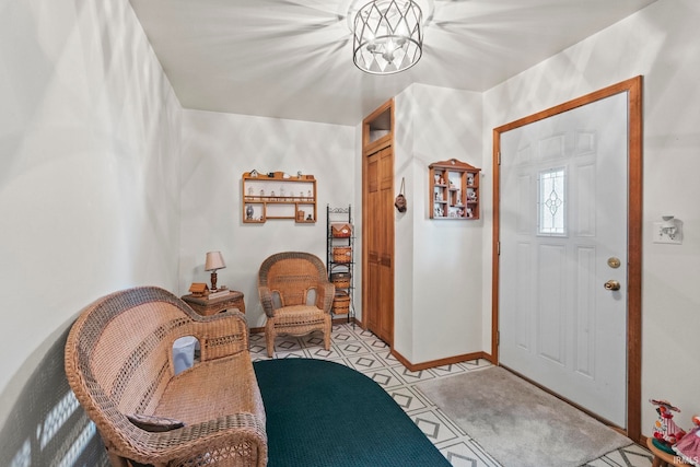 entrance foyer featuring a notable chandelier