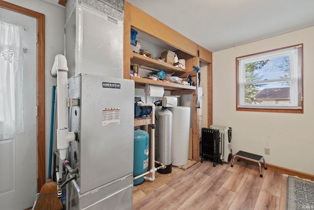 utility room with radiator