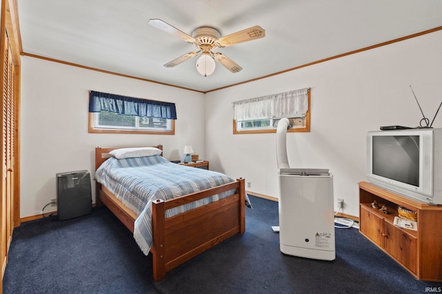 bedroom with ornamental molding, dark carpet, and ceiling fan