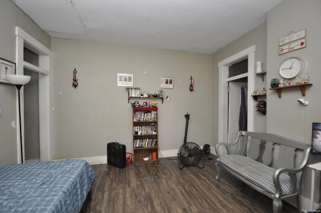 bedroom featuring dark hardwood / wood-style flooring