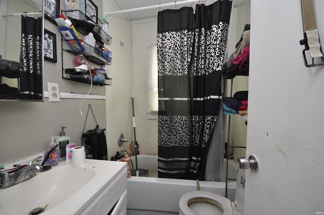 full bathroom featuring shower / bathtub combination with curtain, vanity, and toilet