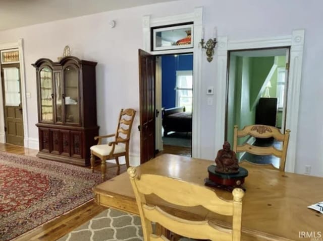 sitting room with hardwood / wood-style flooring