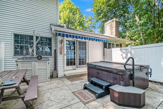 view of patio with a hot tub