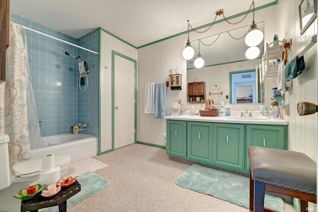 full bathroom featuring shower / tub combo with curtain, vanity, and toilet