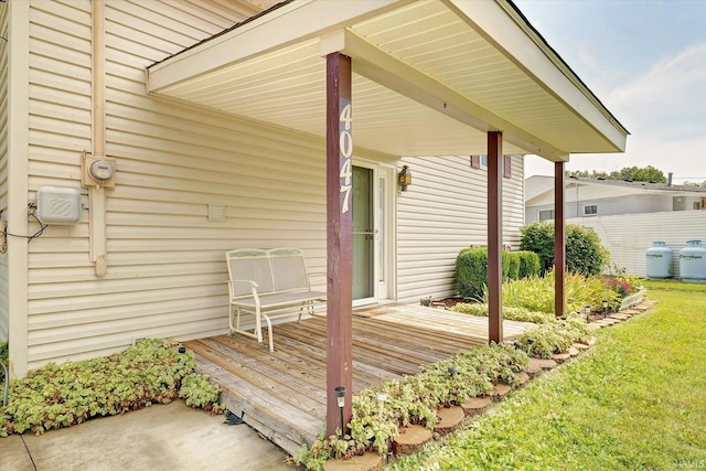 deck featuring a lawn