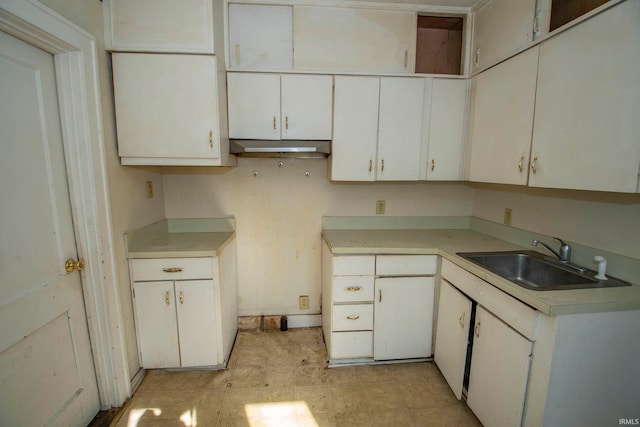 kitchen with white cabinets and sink