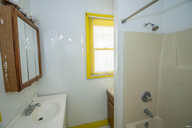 bathroom with tub / shower combination and vanity