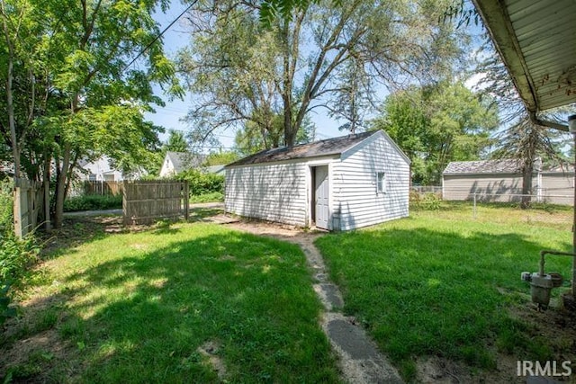 view of yard with a storage shed