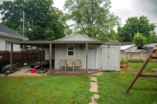 view of outdoor structure with a lawn