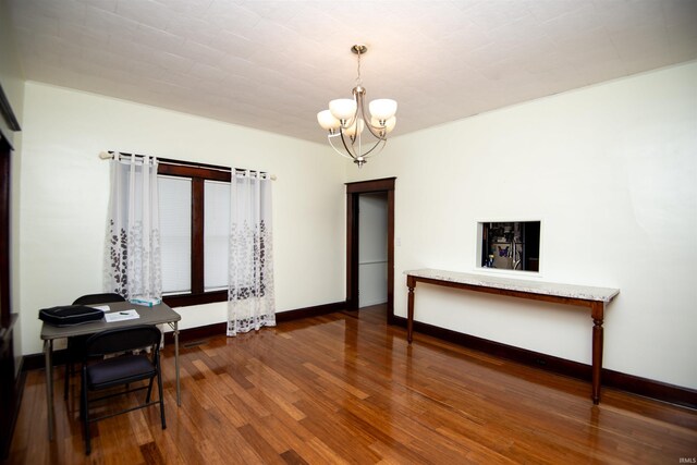 interior space featuring a notable chandelier and hardwood / wood-style floors