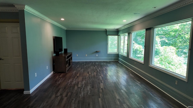 unfurnished living room featuring ornamental molding and dark wood-type flooring