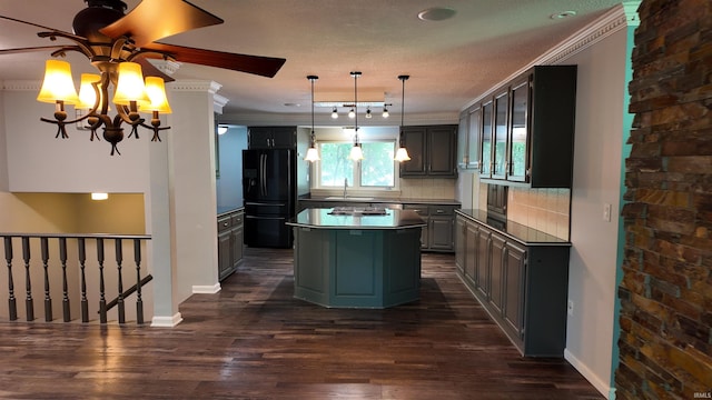 kitchen with a center island, decorative backsplash, crown molding, and black refrigerator with ice dispenser