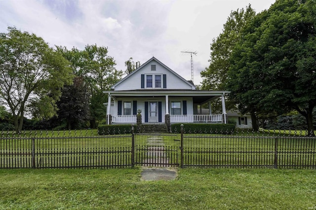 view of front of home with a porch, a front yard, a gate, and a fenced front yard