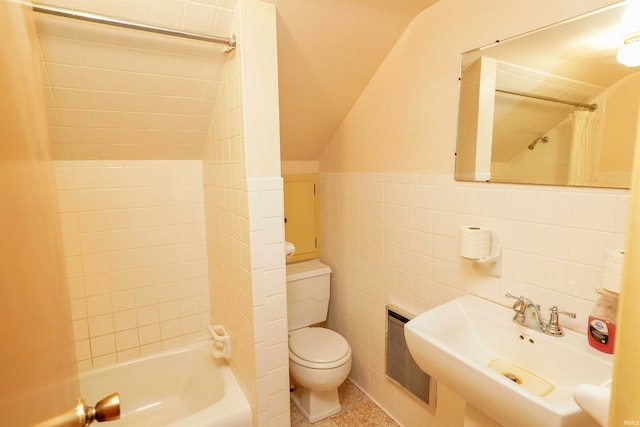 full bathroom with tasteful backsplash, tile walls, shower / bath combination with curtain, sink, and toilet