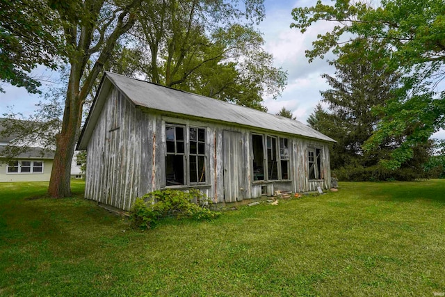 exterior space with a lawn