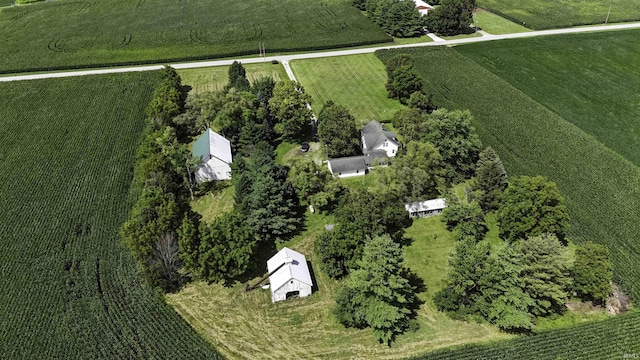 birds eye view of property with a rural view