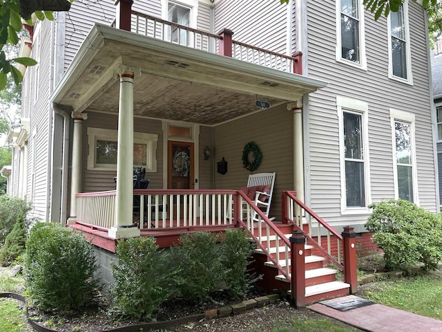 property entrance featuring covered porch