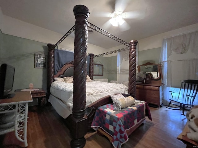 bedroom featuring hardwood / wood-style flooring and ceiling fan