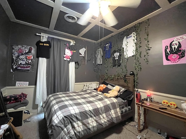 bedroom with carpet floors, coffered ceiling, and ceiling fan