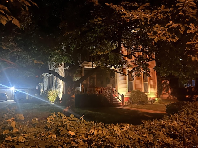 view of property exterior at night