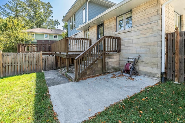 rear view of property with a patio and a yard