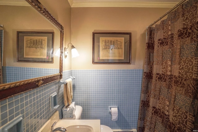 bathroom featuring ornamental molding, tile walls, toilet, and a shower with curtain