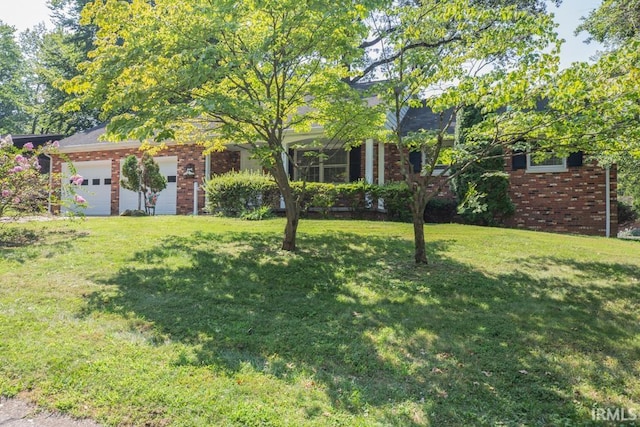 view of yard with a garage