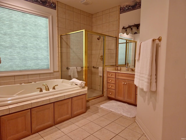 full bathroom featuring tile patterned flooring, visible vents, vanity, a shower stall, and a bath