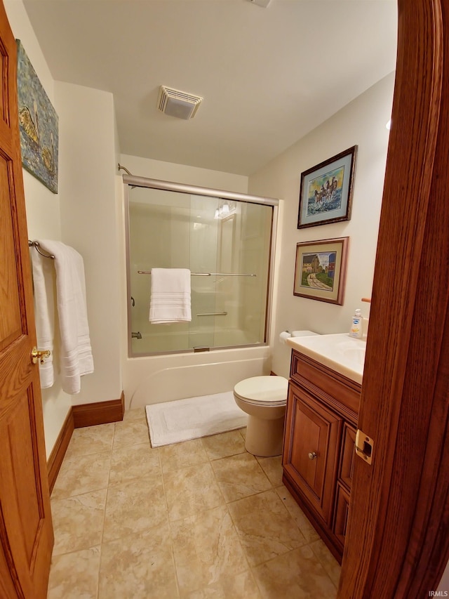 full bathroom featuring visible vents, toilet, enclosed tub / shower combo, vanity, and tile patterned flooring