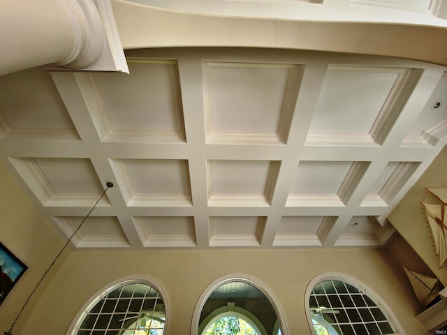 room details featuring coffered ceiling and beam ceiling