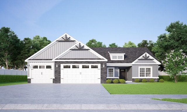 view of front of house with a front lawn and a garage